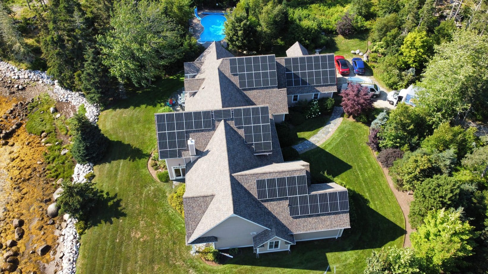 A residential solar property photographed from a camera drone